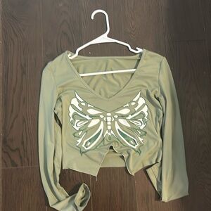 A green butterfly shirt